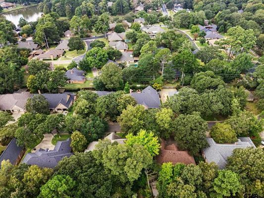 3621 Rock Creek Drive Tyler, TX 75707 - Photo 4 of 29 an aerial view of residential house with outdoor space and trees all around