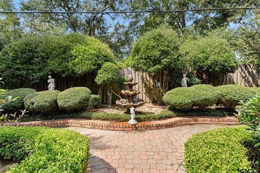 3621 Rock Creek Drive Tyler, TX 75707 - Photo 8 of 29 a view of a park with plants and large trees