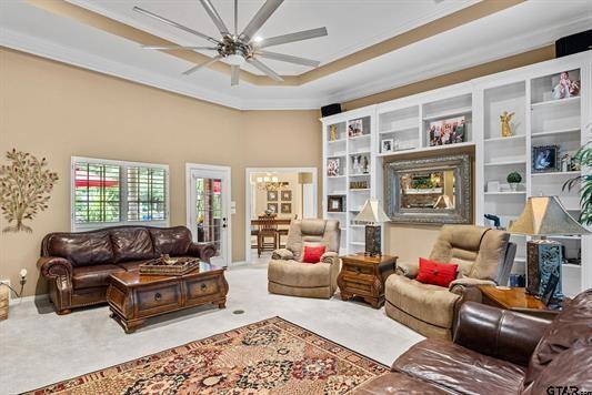 3621 Rock Creek Drive Tyler, TX 75707 - Photo 9 of 29 a living room with furniture ceiling fan and a rug
