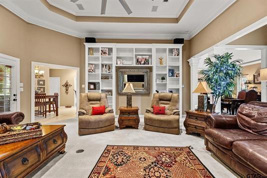 3621 Rock Creek Drive Tyler, TX 75707 - Photo 10 of 29 a living room with furniture and a fireplace