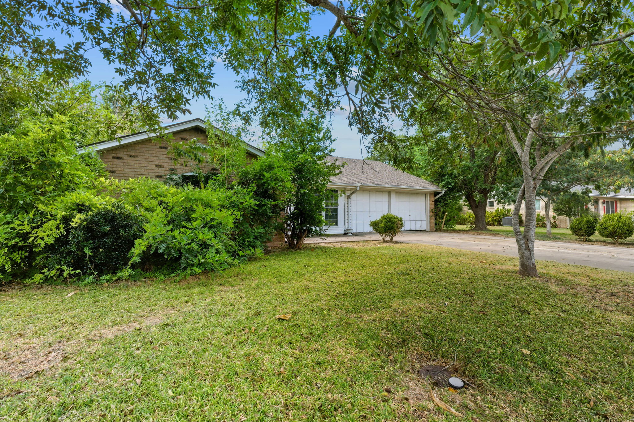 2405 Grace Street Taylor, TX 76574 - Photo 2 of 19 a front view of a house with a yard