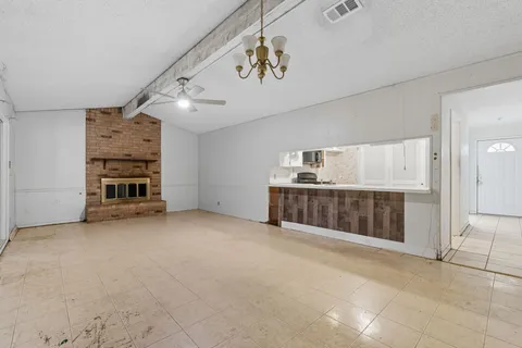 a view of a livingroom with a fireplace