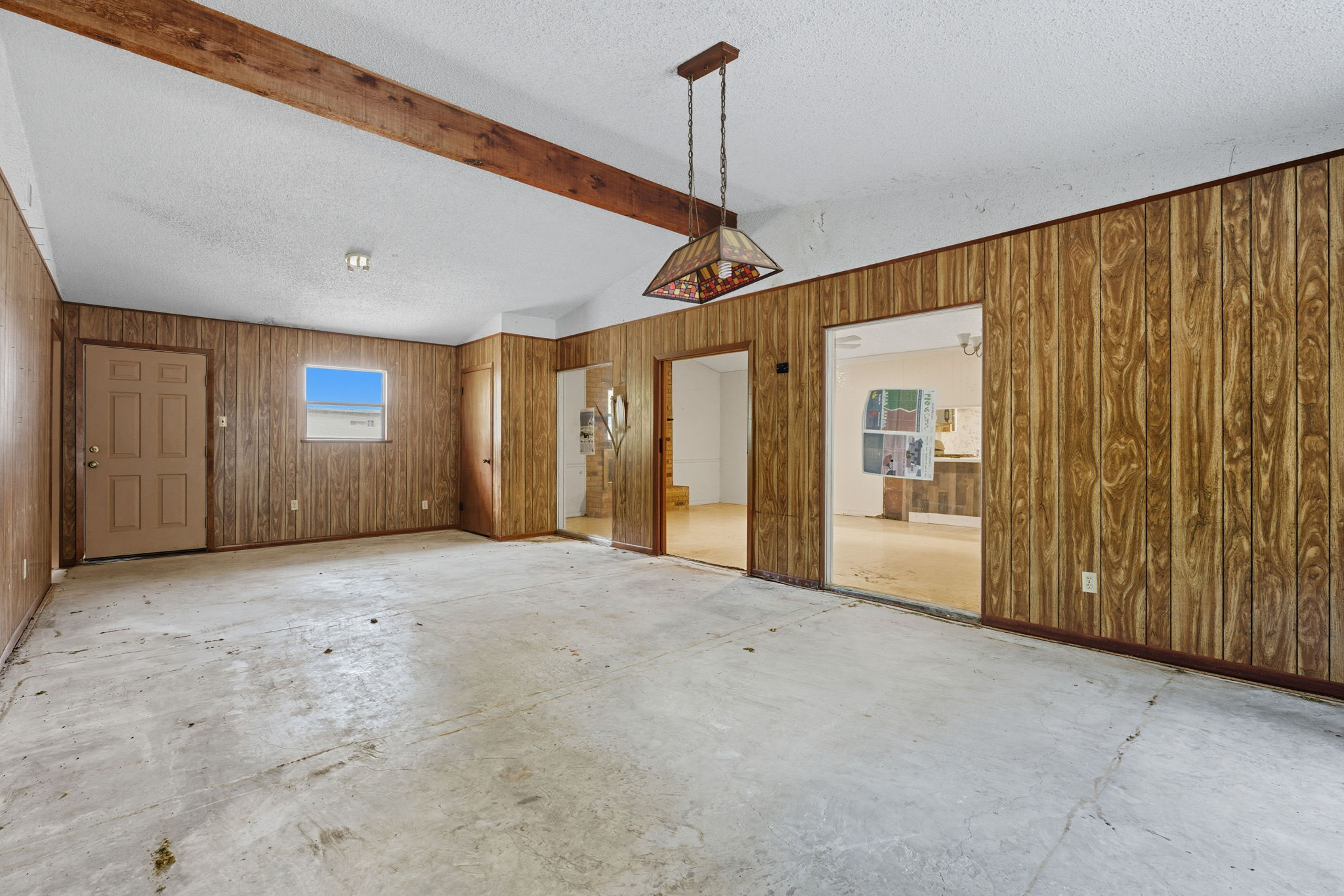 2405 Grace Street Taylor, TX 76574 - Photo 9 of 19 a view of a big room with closet and windows