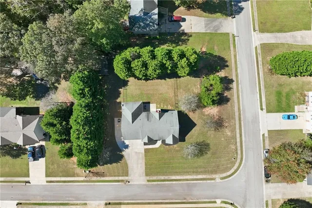 front view of a house with a fountain
