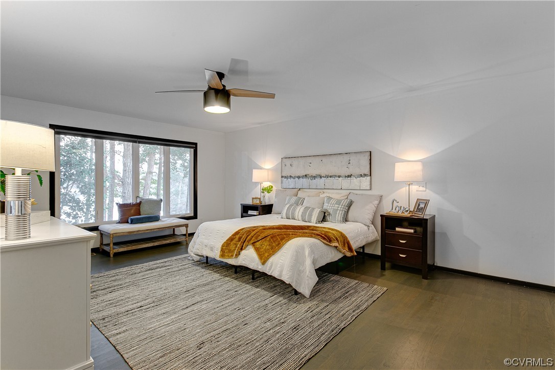 5623 Promontory Pointe Road Midlothian, VA 23112 - Photo 19 of 50 Bedroom featuring ceiling fan and dark wood-type f