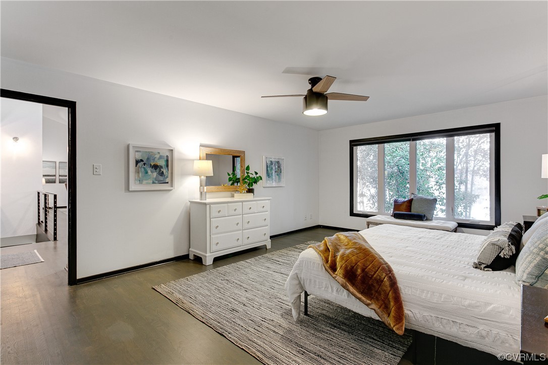 5623 Promontory Pointe Road Midlothian, VA 23112 - Photo 20 of 50 Bedroom featuring ceiling fan and dark hardwood /