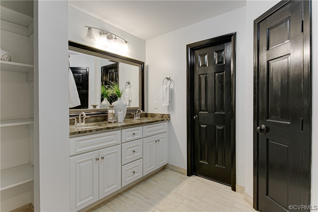 5623 Promontory Pointe Road Midlothian, VA 23112 - Photo 21 of 50 Bathroom with tile floors and dual vanity