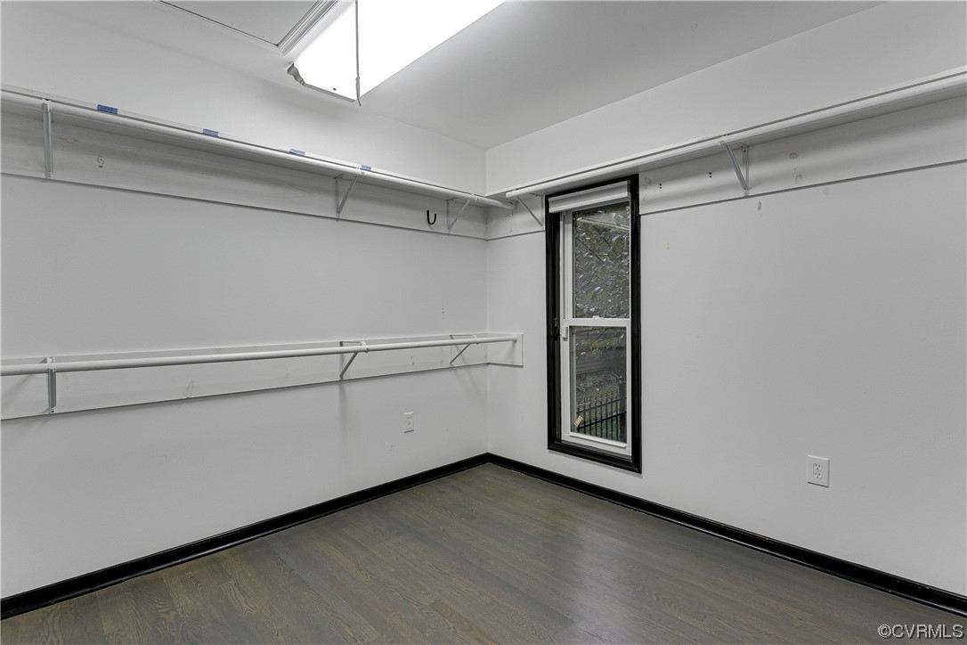5623 Promontory Pointe Road Midlothian, VA 23112 - Photo 25 of 50 Walk in closet with dark wood-type flooring