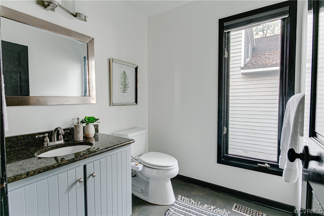 5623 Promontory Pointe Road Midlothian, VA 23112 - Photo 26 of 50 Bathroom featuring vanity, hardwood / wood-style f