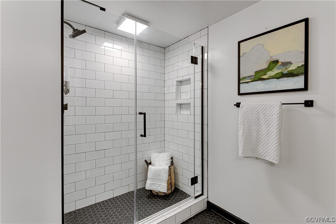 5623 Promontory Pointe Road Midlothian, VA 23112 - Photo 29 of 50 Bathroom with tile flooring and an enclosed shower