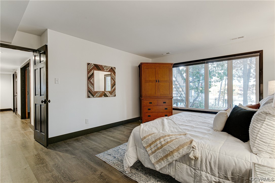 5623 Promontory Pointe Road Midlothian, VA 23112 - Photo 32 of 50 Bedroom featuring dark hardwood / wood-style floor