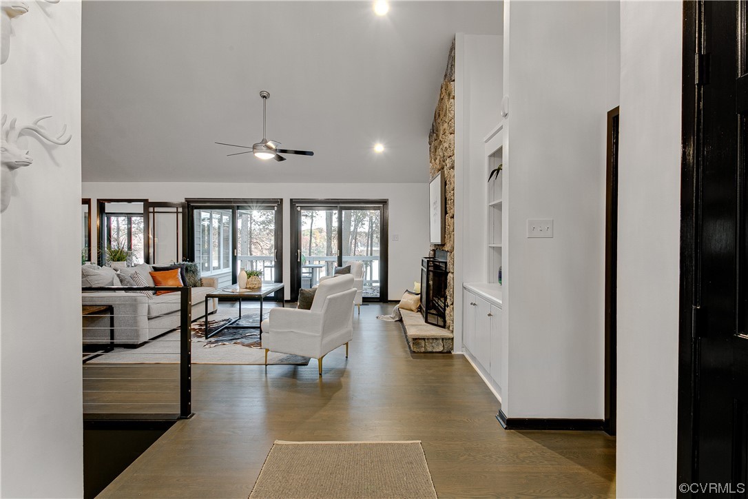 5623 Promontory Pointe Road Midlothian, VA 23112 - Photo 4 of 50 Living room with dark wood-type flooring, high vau