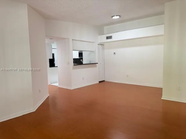 a view of a kitchen with a sink