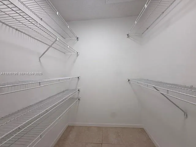 a view of a room with racks on the wall