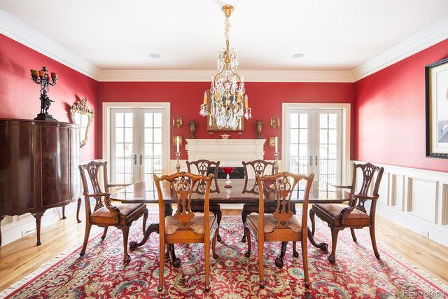 a view of a dining room with furniture and window