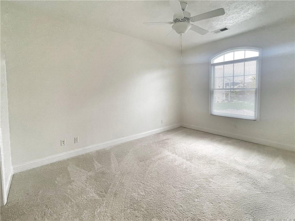 207 Adams Pointe Boulevard, Unit 6 Mars, PA 16046 - Photo 15 of 22 an empty room with windows