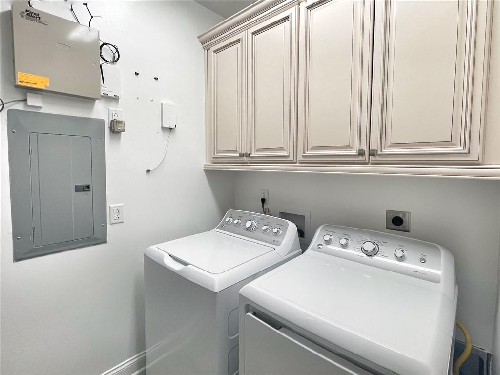 207 Adams Pointe Boulevard, Unit 6 Mars, PA 16046 - Photo 18 of 22 a utility room with dryer and washer