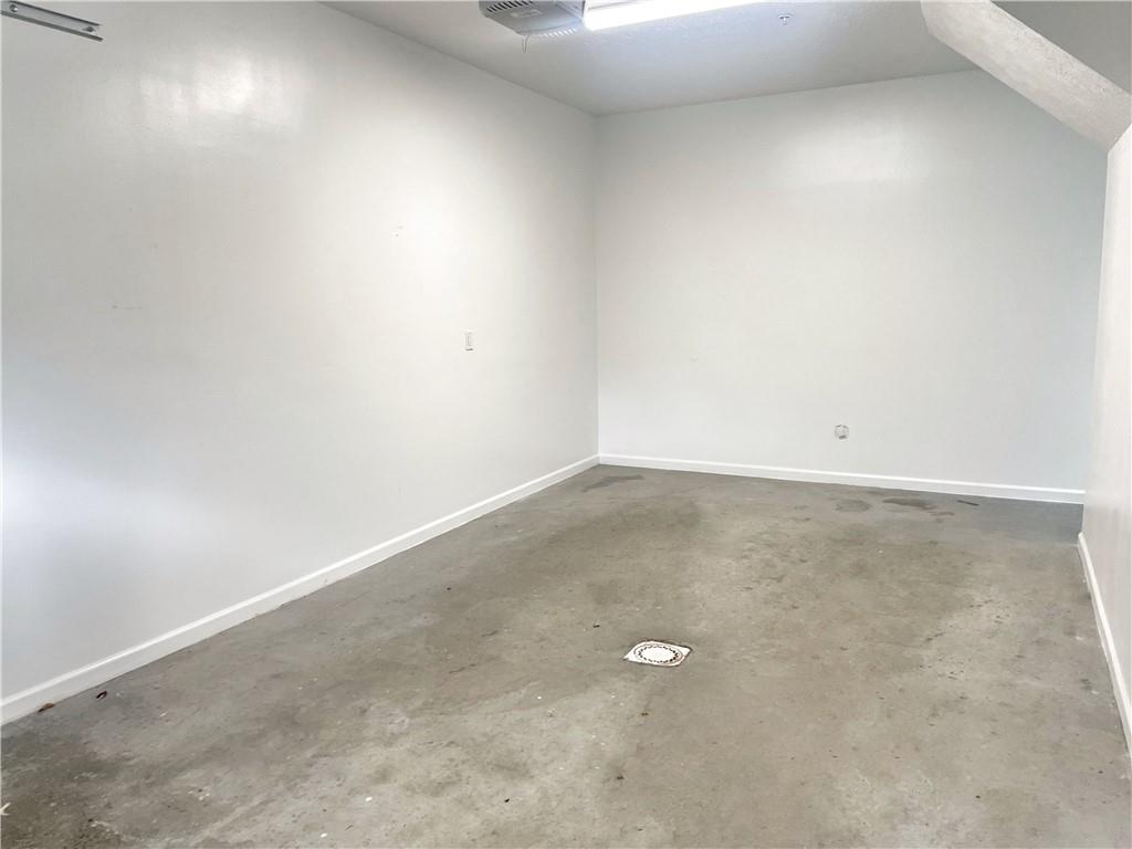 207 Adams Pointe Boulevard, Unit 6 Mars, PA 16046 - Photo 19 of 22 an empty room with an entryway