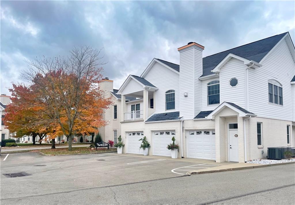 207 Adams Pointe Boulevard, Unit 6 Mars, PA 16046 - Photo 22 of 22 front view of a house with a street