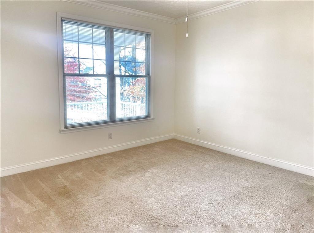 207 Adams Pointe Boulevard, Unit 6 Mars, PA 16046 - Photo 10 of 22 an empty room with a window