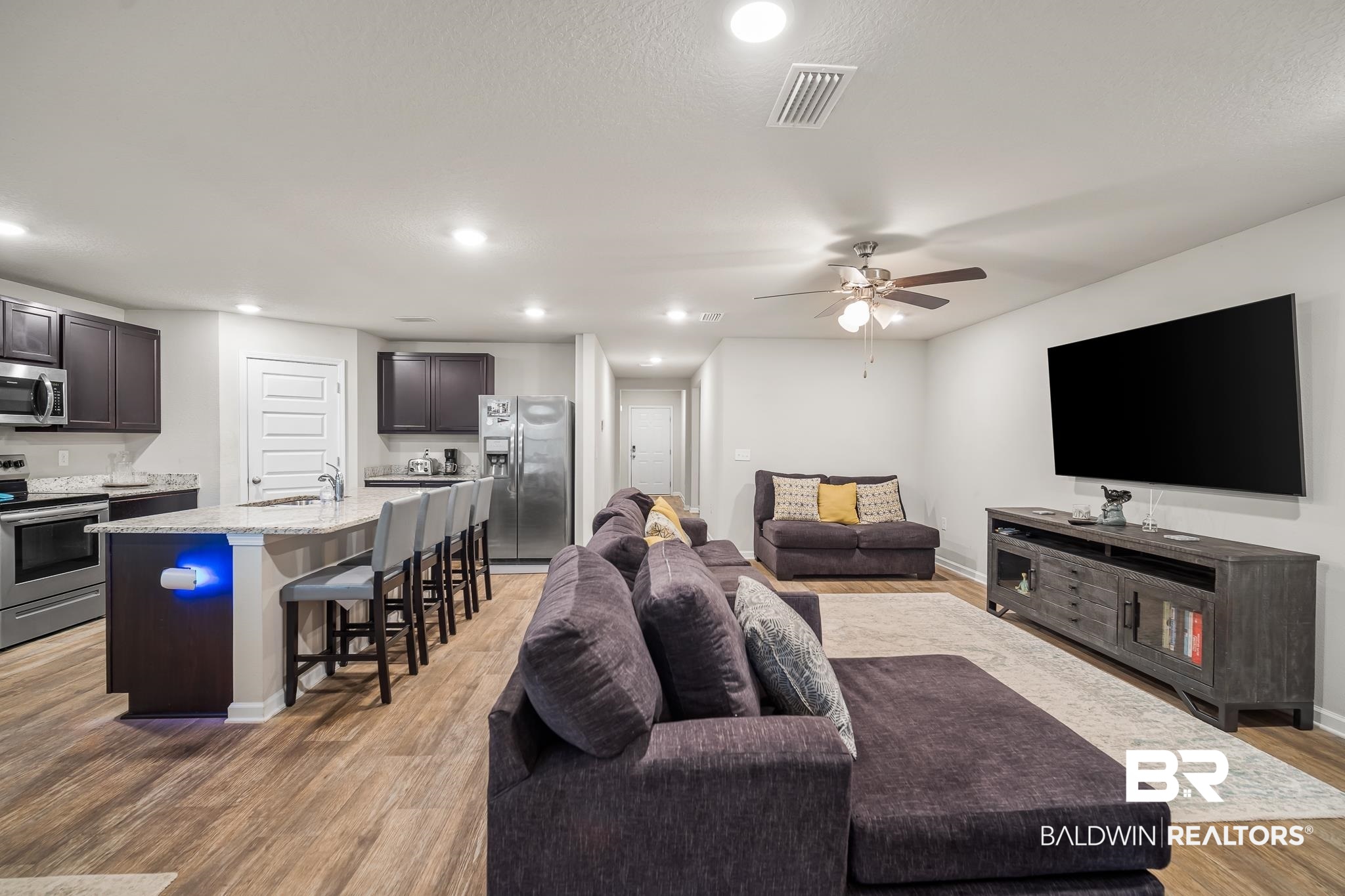 10074 Brodick Loop Daphne, AL 36527 - Photo 2 of 23 Living Room/Kitchen