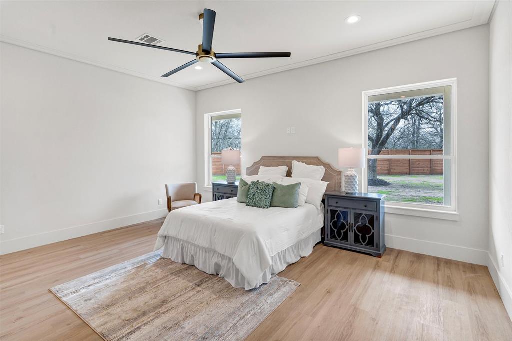 428 Squaw Creek Road Willow Park, TX 76087 - Photo 23 of 34 a bedroom with a bed and a window