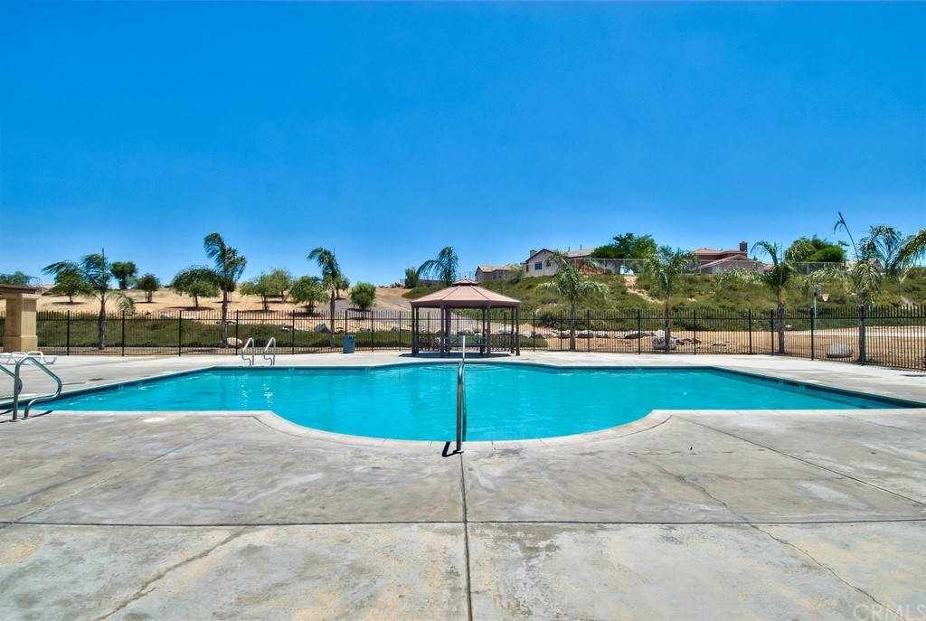 33733 Plowshare Road Wildomar, CA 92595 - Photo 37 of 38 a view of swimming pool with outdoor seating