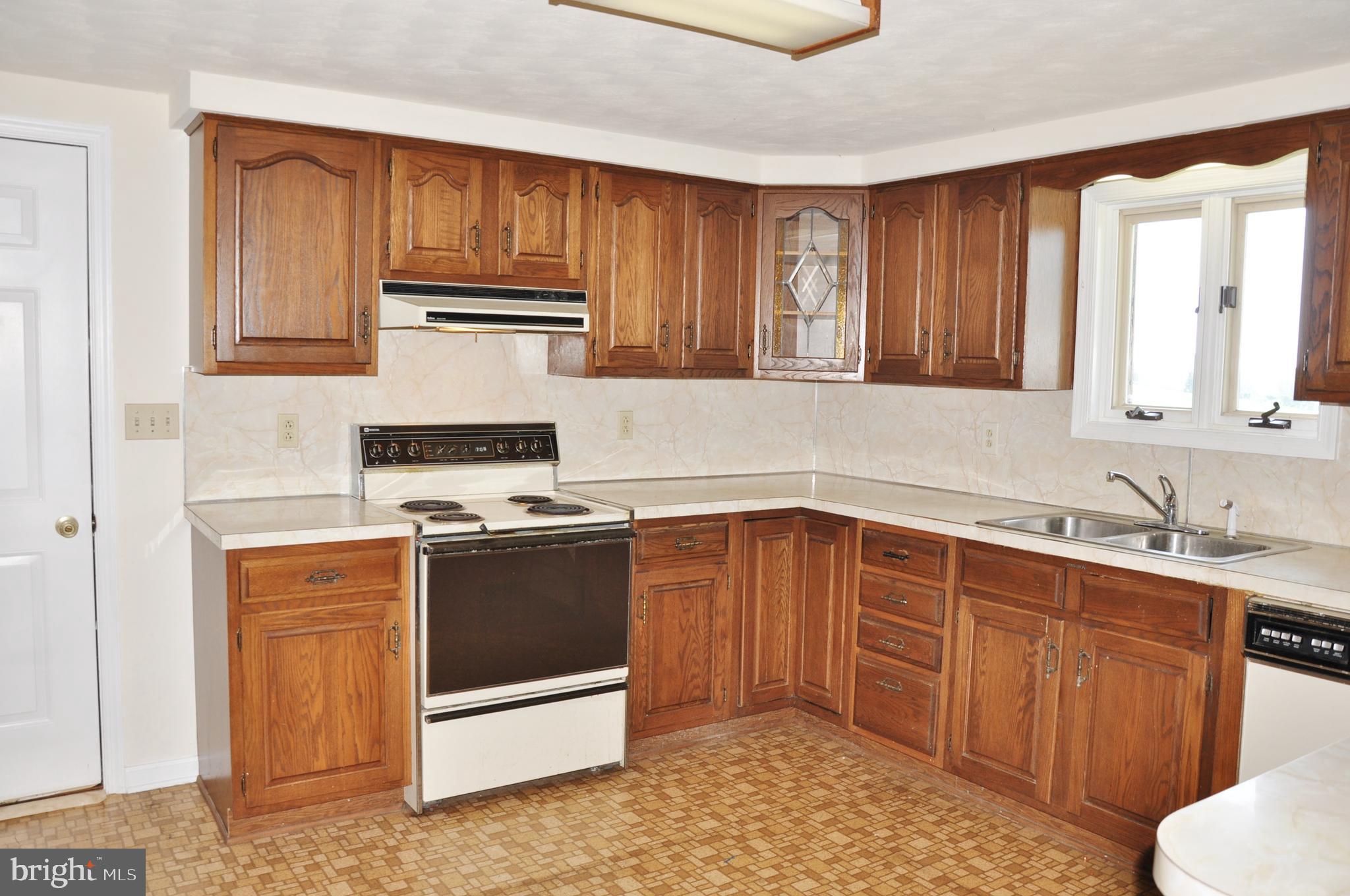 3000 Jefferson Road Spring Grove, PA 17362 - Photo 12 of 63 a kitchen with sink cabinets and stainless steel appliances