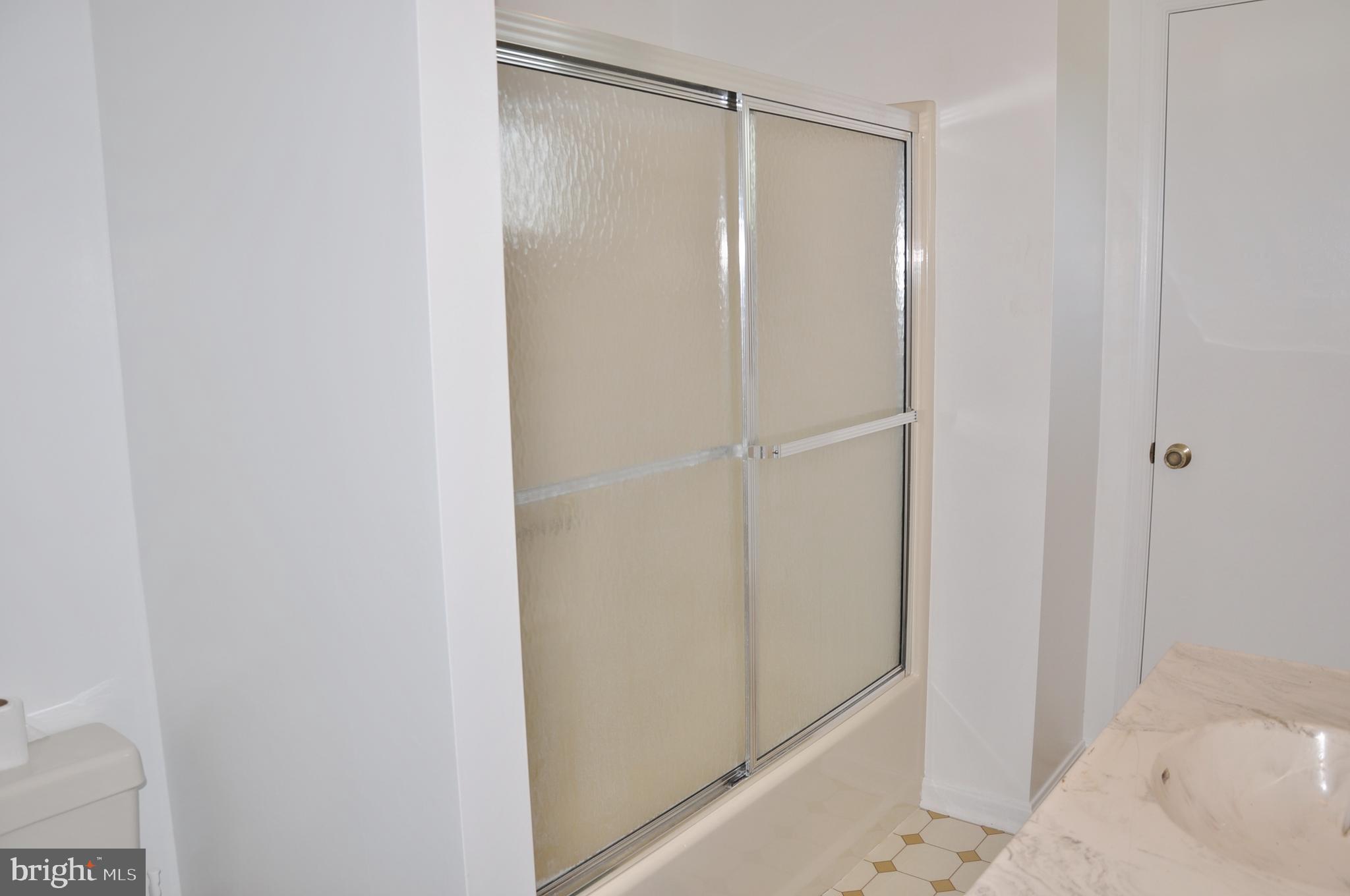 3000 Jefferson Road Spring Grove, PA 17362 - Photo 29 of 63 a bathroom with a glass shower door