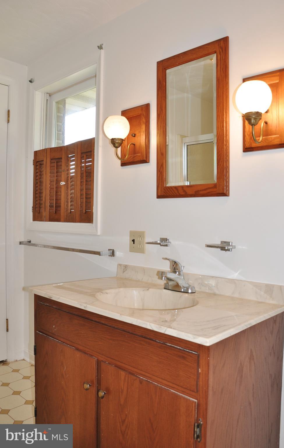 3000 Jefferson Road Spring Grove, PA 17362 - Photo 31 of 63 a bathroom with a sink and a mirror