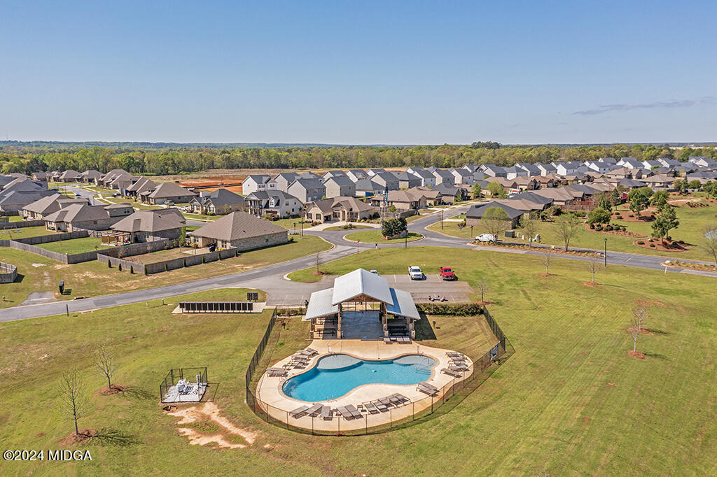 106 Cornfield Circle, Unit 57 Perry, GA 31069 - Photo 18 of 18 an aerial view of residential houses with outdoor space