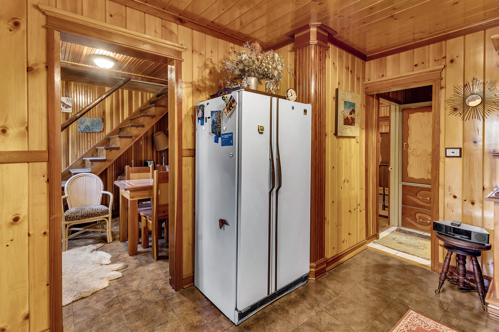 54865 Strong Drive Idyllwild, CA 92549 - Photo 13 of 27 a view of a hallway with a chair and dining table