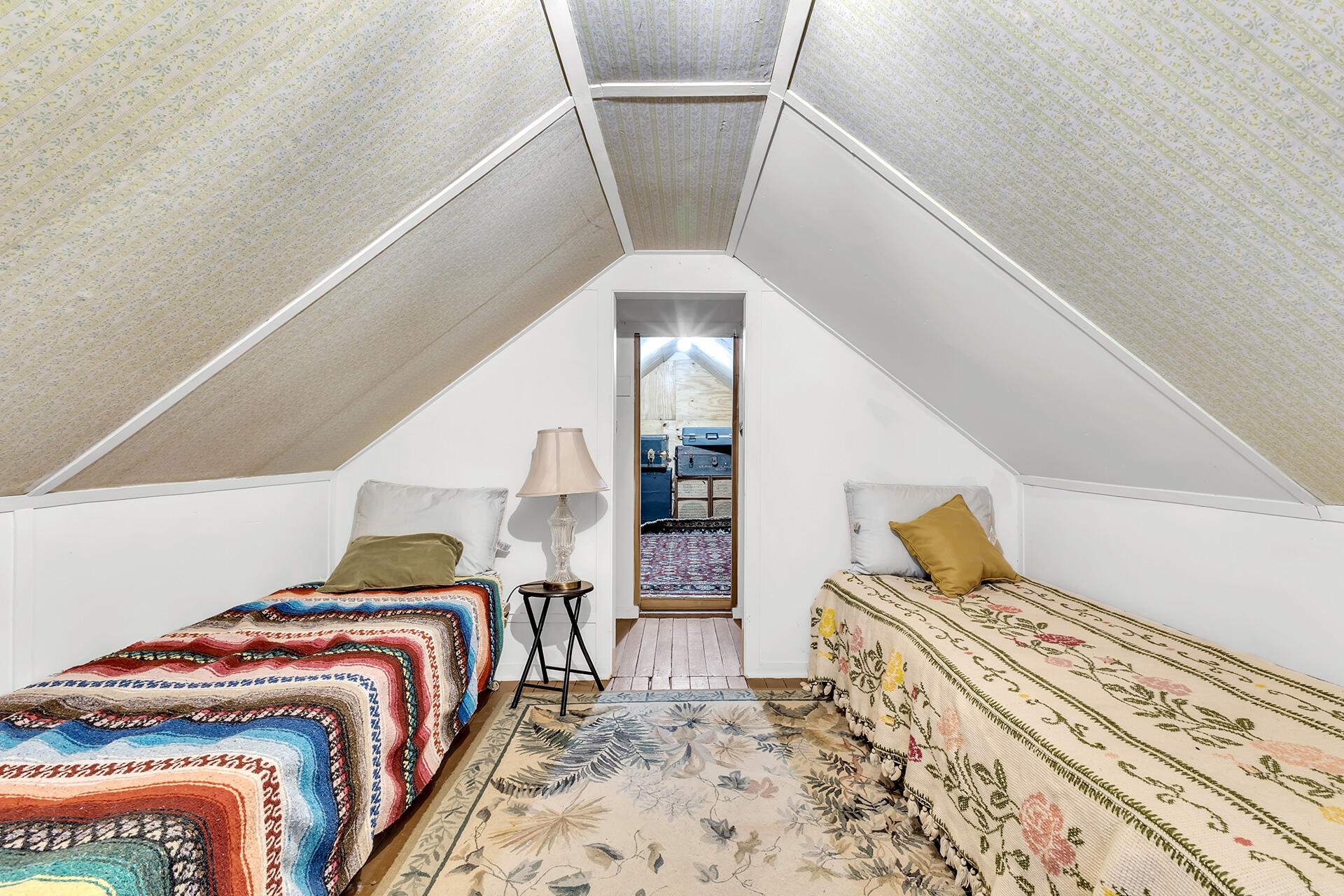 54865 Strong Drive Idyllwild, CA 92549 - Photo 22 of 27 a bedroom with a bed and wooden floor