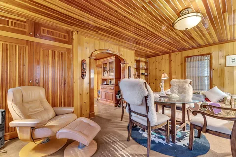 a view of a dining room with furniture