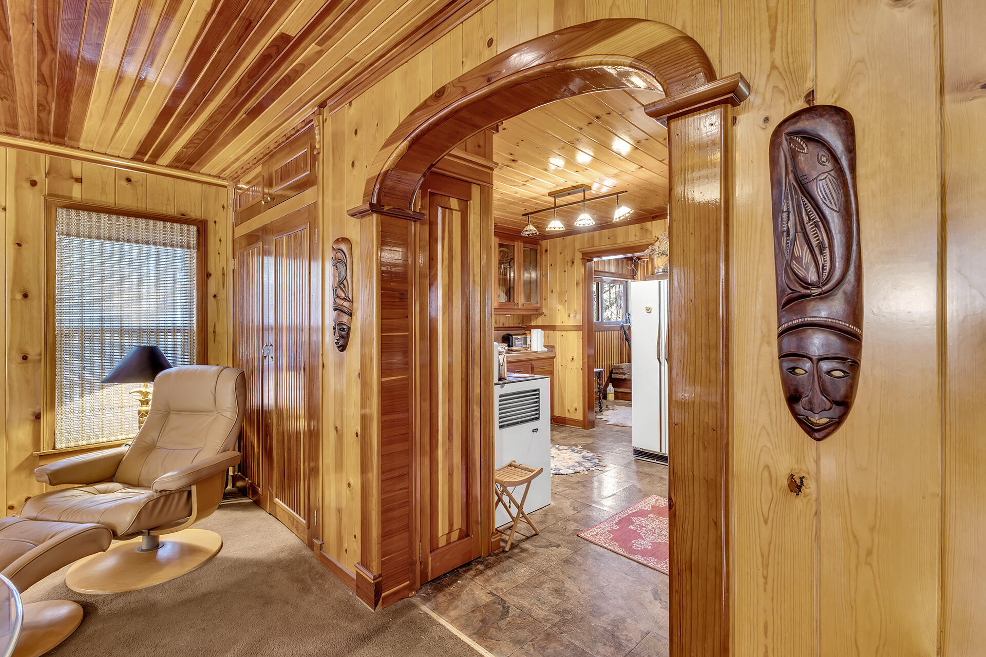 54865 Strong Drive Idyllwild, CA 92549 - Photo 10 of 27 a view of a hallway with entryway dining area and chandelier