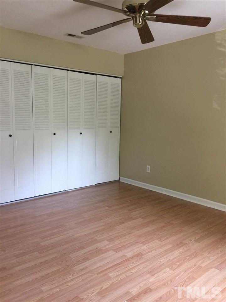 1034 Randolph Court Cary, NC 27511 - Photo 8 of 14 a view of a room with wooden floor