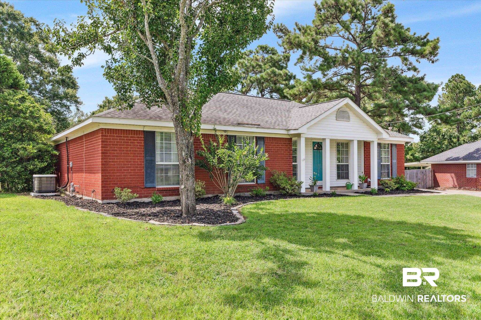 9306 Prairie Drive Semmes, AL 36575 - Photo 19 of 20 Ranch-style house with a front lawn