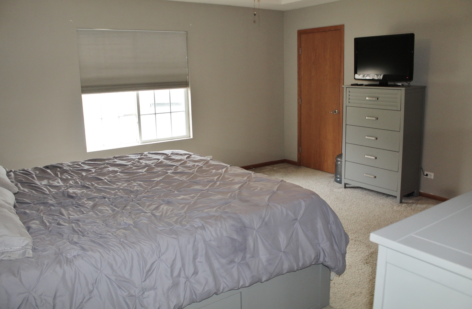 1445 Scott Circle Morris, IL 60450 - Photo 14 of 31 a bedroom with a bed and a television