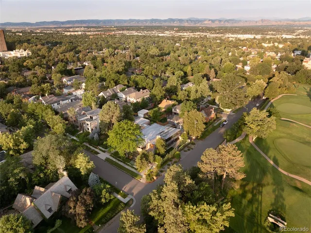 a view of living room with furniture and book shelf