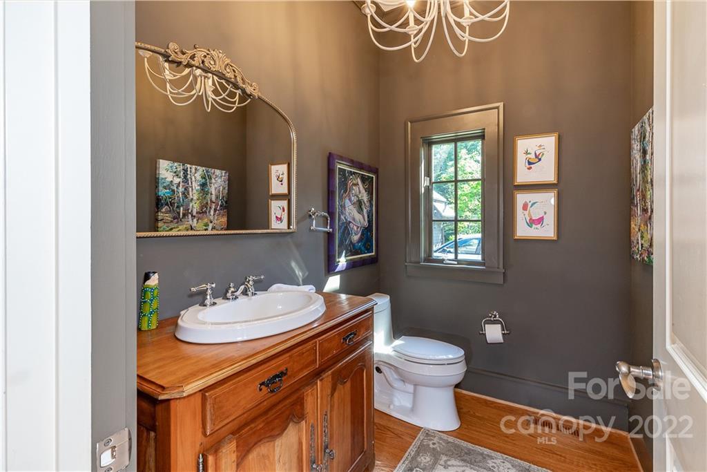 146 Allison Creek Trail Brevard, NC 28712 - Photo 17 of 48 a bathroom with a toilet sink and mirror