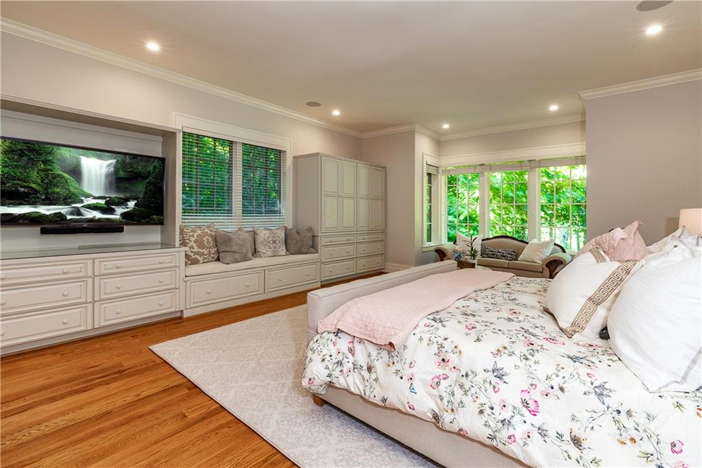146 Allison Creek Trail Brevard, NC 28712 - Photo 18 of 48 a spacious bedroom with a large bed and a large window