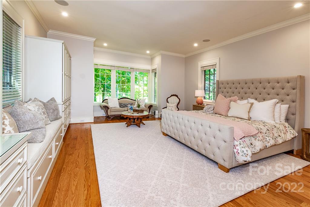 146 Allison Creek Trail Brevard, NC 28712 - Photo 19 of 48 a bed room with a bed and a large window