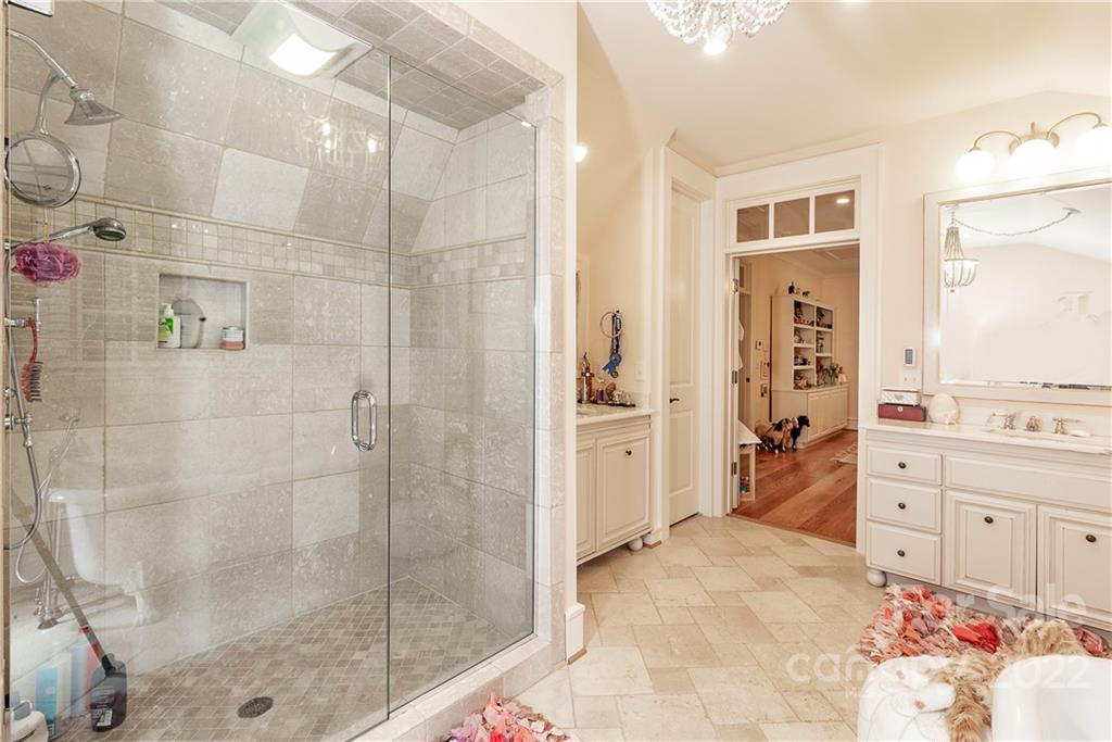 146 Allison Creek Trail Brevard, NC 28712 - Photo 28 of 48 a bathroom with a sink mirror and shower