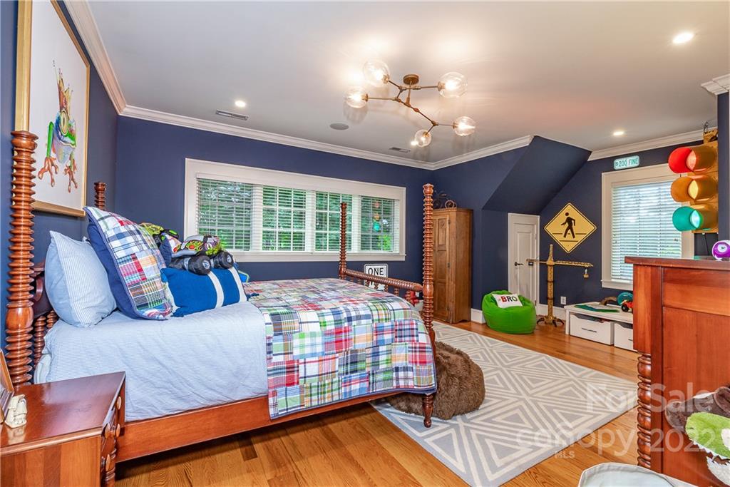 146 Allison Creek Trail Brevard, NC 28712 - Photo 29 of 48 a bedroom with furniture and a large window
