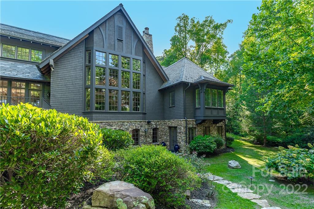 146 Allison Creek Trail Brevard, NC 28712 - Photo 48 of 48 a front view of a house with garden