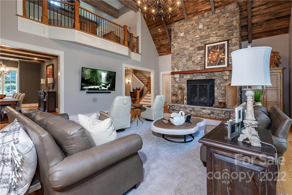 146 Allison Creek Trail Brevard, NC 28712 - Photo 5 of 48 a living room with furniture and a fireplace