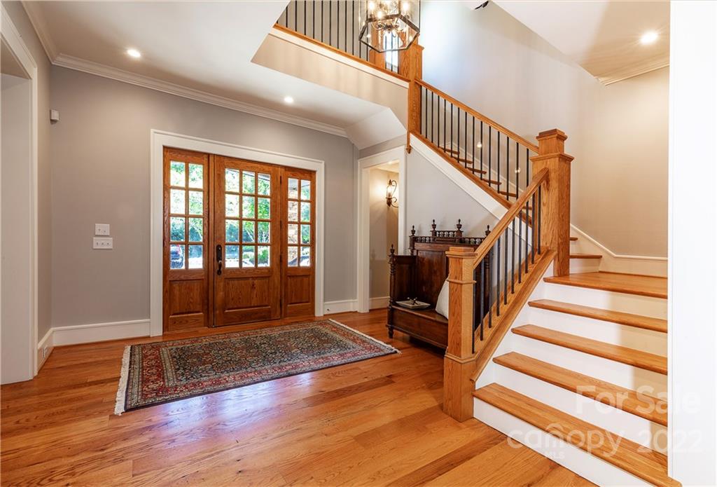 146 Allison Creek Trail Brevard, NC 28712 - Photo 8 of 48 a view of entryway with wooden floor and stairs