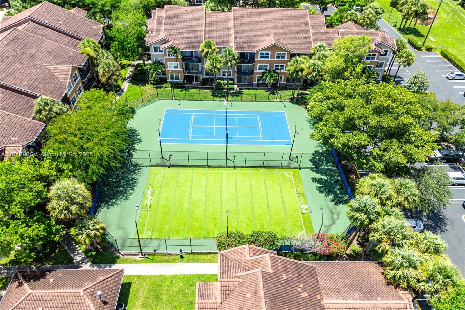 8721 Wiles Road, Unit 105 Coral Springs, FL 33067 - Photo 40 of 49 an aerial view of a swimming pool