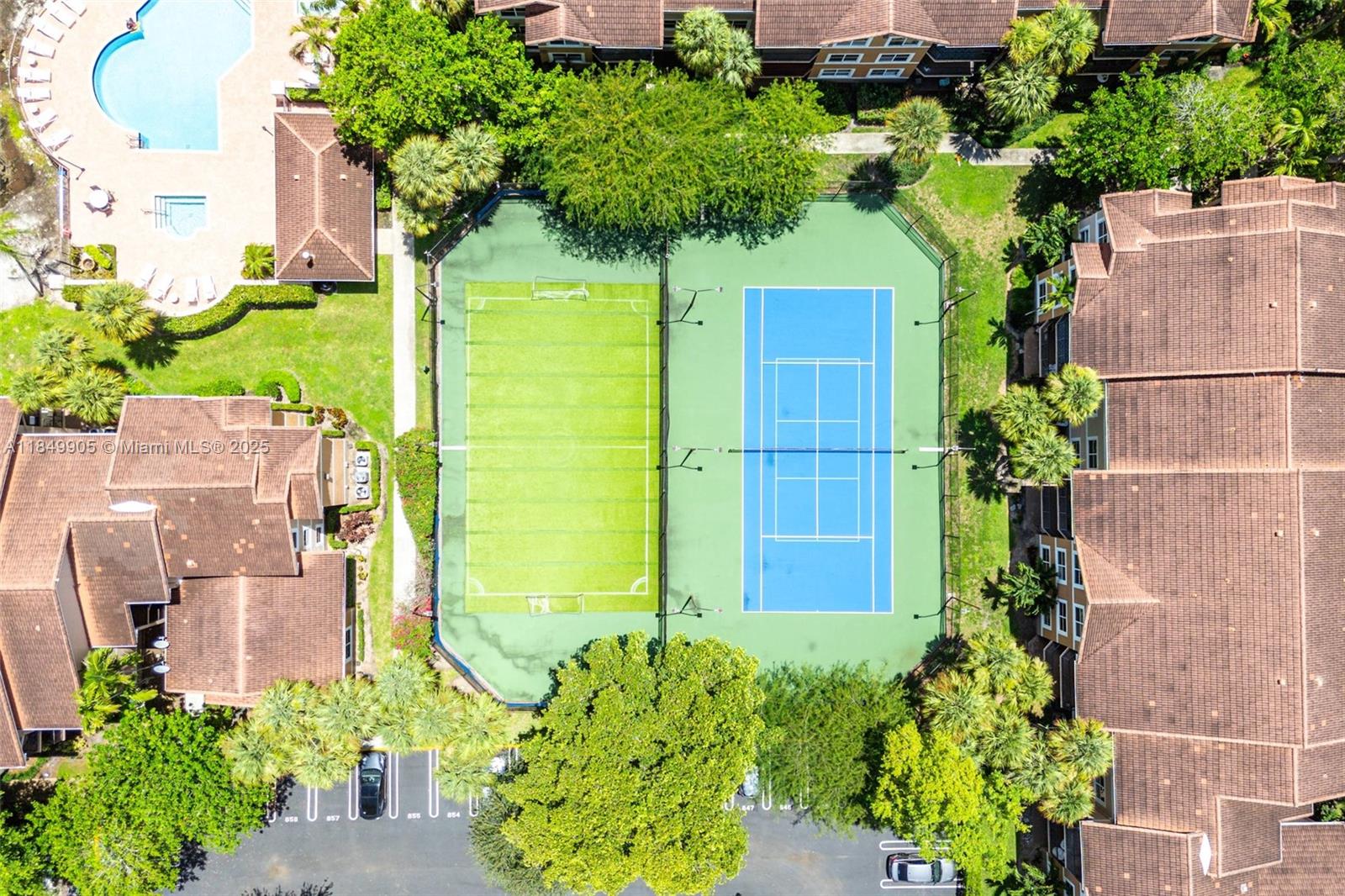 8721 Wiles Road, Unit 105 Coral Springs, FL 33067 - Photo 41 of 49 an aerial view of a house with a yard