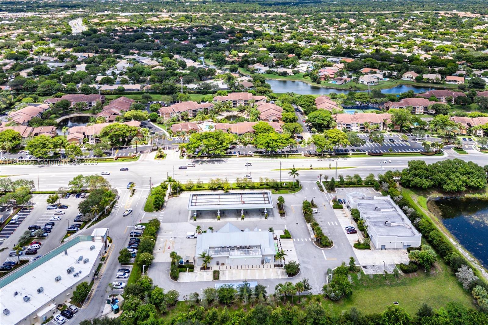 8721 Wiles Road, Unit 105 Coral Springs, FL 33067 - Photo 45 of 49 an aerial view of residential houses with outdoor space